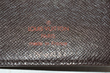 Louis Vuitton, " Portefeuille long " en toile enduite damier ébène