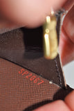 Louis Vuitton, Portefeuille TRESOR  en toile enduite damier ébène ph2