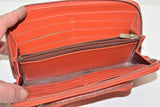 LONGCHAMP, Portefeuille compagnon, en cuir orange, ligne "quadri"