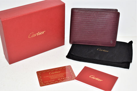 Cartier, Joli porte-cartes en cuir bordeaux