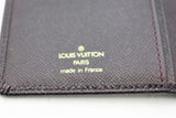 Louis Vuitton, Portefeuille long en cuir taïga aubergine