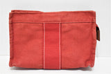 Hermès, Trousse de toilette "TOTO" en toile coton rouge