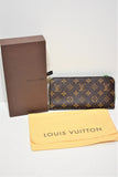 Louis Vuitton, Portefeuille en toile monogram " insolite IKAT "et intérieur vert