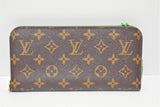 Louis Vuitton, Portefeuille en toile monogram " insolite IKAT "et intérieur vert